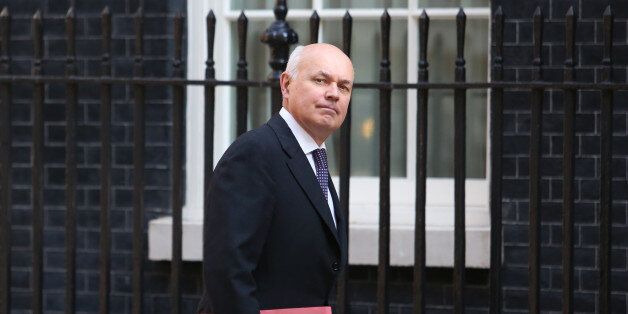 Iain Duncan Smith, U.K. work and pensions secretary, arrives to attend the weekly government cabinet meeting at number 10 Downing Street in London, U.K., on Tuesday, July 9, 2013. Rising consumer confidence is good news for Prime Minister David Cameron at a time when his Conservative Party is trailing behind the opposition Labour Party in opinion polls less than two years before the next general election. Photographer: Chris Ratcliffe/Bloomberg via Getty Images