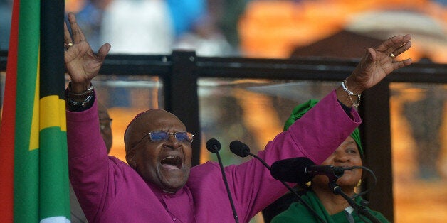 South African Archbishop and Honorary Elders Desmond Tutu speaks during the memorial service of South African former president Nelson Mandela at the FNB Stadium (Soccer City) in Johannesburg on December 10, 2013. Mandela, the revered icon of the anti-apartheid struggle in South Africa and one of the towering political figures of the 20th century, died in Johannesburg on December 5 at age 95. AFP PHOTO / ALEXANDER JOE (Photo credit should read ALEXANDER JOE/AFP/Getty Images)