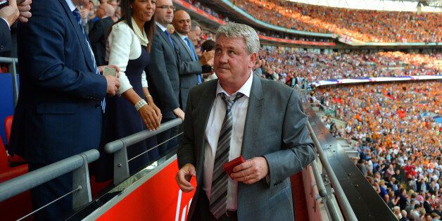 LONDON, ENGLAND - MAY 17: Steve Bruce, manager of Hull City looks after reciving his runner-up medal after the FA Cup with Budweiser Final match between Arsenal and Hull City at Wembley Stadium on May 17, 2014 in London, England. (Photo by Michael Regan - The FA/The FA via Getty Images)
