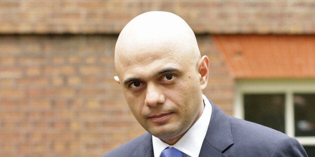 Culture secretary Sajid Javid in the Downing Street garden, London, to help launch the Royal British Legion's poppy campaign - whereby the RBL will send every school in the country free poppy seeds to plant with the aim of helping to raise childrens awareness of conflict.