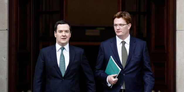 George Osborne, U.K. chancellor of the exchequer, left, and Danny Alexander, U.K. chief secretary to the treasury, leave the HM Treasury building for the Houses of Parliament in London, U.K., on Thursday, Dec. 5, 2013. Osborne will deliver his end-of-year report today against the brightest economic backdrop since the coalition took office more than three years ago. Photographer: Simon Dawson/Bloomberg via Getty Images