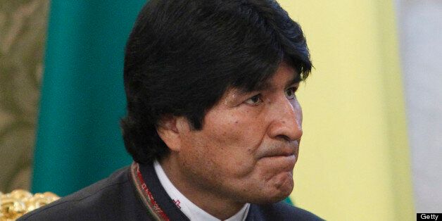 Bolivian President Evo Morales attends a meeting with his Russian counterpart Vladimir Putin at the Kremlin in Moscow, on July 2, 2013. Fugitive US intelligence leaker Edward Snowden was denied asylum by a host of countries today after applying for a safe haven in 21 nations spanning the globe in hopes of winning protection from American justice. Bolivian President Evo Morales said his country was willing to consider giving Snowden asylum. AFP PHOTO / POOL/ MAXIM SHEMETOV (Photo credit sh