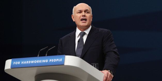 MANCHESTER, ENGLAND - OCTOBER 01: Iain Duncan Smith, the Secretary of State for Work and Pensions, delivers his speech in the Main Hall of Manchester Central on the third day, and penultimate day, of the Conservative Party Conference on October 1, 2013 in Manchester, England. David Cameron has unveiled a Government pilot scheme for GP surgeries to open from 8am until 8pm seven days, backed by 50 million GBP of funding. (Photo by Oli Scarff/Getty Images)