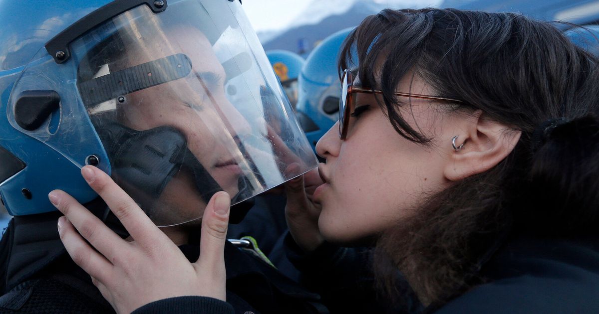 Italian Police Kiss Photo Sees Nina De Chiffre Accused Of Sexual