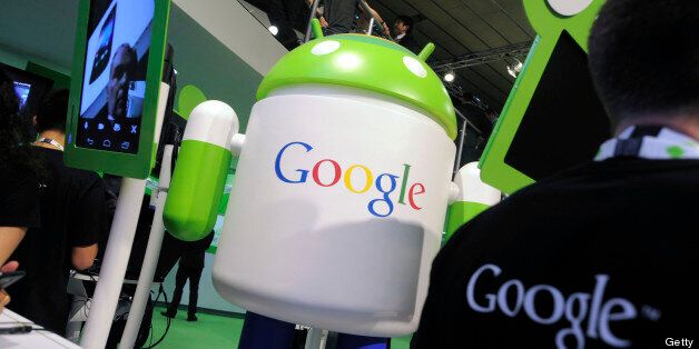 An Android operating software icon sits on display with a Google Inc. logo at the Google booth at the Mobile World Congress in Barcelona, Spain, on Wednesday, Feb. 29, 2012. The Mobile World Congress, operated by the GSMA, expects 60,000 visitors and 1400 companies to attend the four-day technology industry event which runs Feb. 27 through March 1. Photographer: Denis Doyle/Bloomberg via Getty Images