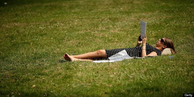 LONDON, ENGLAND - JUNE 19: A member of the public enjoys the hot weather in St James Park on June 19, 2013 in London, England. Whilst the country is currently experiencing high temperatures, there has been a prediction by senior meteorologists that Britain may be expecting up to 10 years of rainy summers due to warming of the North Atlantic waters. (Photo by Matthew Lloyd/Getty Images)