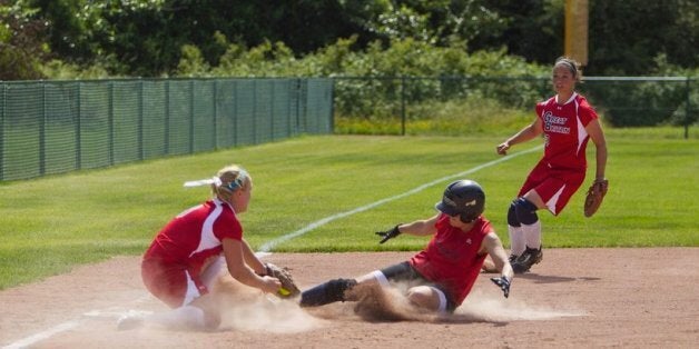 Members of the GB team making a tag at third