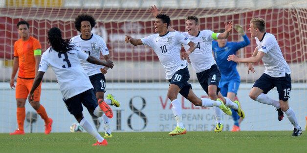 ATTARD, MALTA - MAY 21: Dominic Solanke (C) of England celebrates with team mates after scoring the opening goal during the UEFA Under17 European Championship 2014 final match between England and Netherlands at Ta' Qali National Stadium on May 21, 2014 in Attard, Malta. (Photo by Sascha Steinbach/Bongarts/Getty Images)