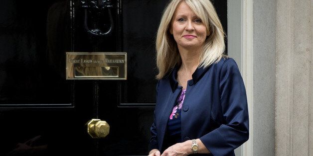 Former Minister for the Disabled Esther McVey poses for pictures outside 10 Downing Street in London, on October 7, 2013. McVey replaces Mark Hoban as Employment Minister as a government reshuffle began Monday. AFP PHOTO/Leon Neal (Photo credit should read LEON NEAL/AFP/Getty Images)