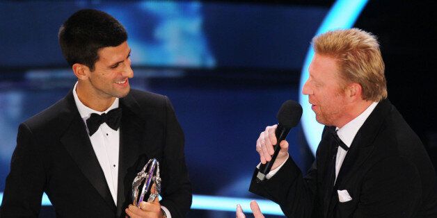 LONDON, ENGLAND - FEBRUARY 06: Academy member Boris Becker speaks to tennis player Novak Djokovic winner of the Laureus World Sportsman of the Year on stage at the 2012 Laureus World Sports Awards at Central Hall Westminster on February 6, 2012 in London, England. (Photo by Matthew Lewis/Getty Images for Laureus)
