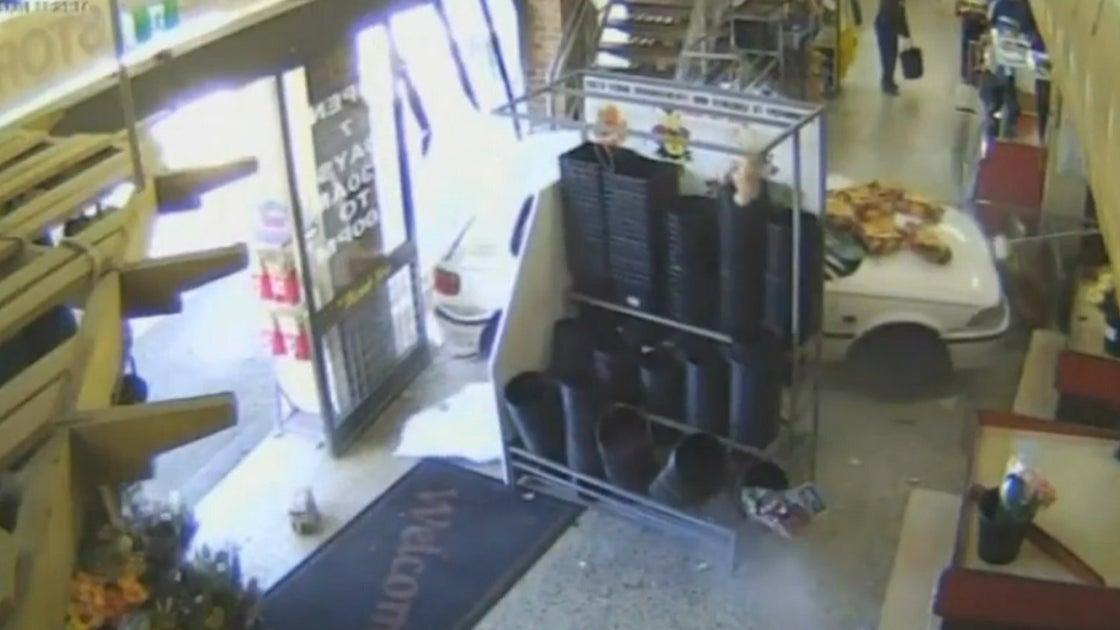 Woman Drives Through Supermarket Window