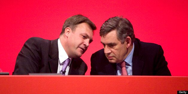 UNITED KINGDOM - SEPTEMBER 30: Ed Balls, U.K. education secretary, left, speaks with Gordon Brown, U.K. prime minister, during the Labour party conference in Brighton, U.K., on Wednesday, Sept. 30, 2009. Brown's attack on bankers and the rich won praise from traditional supporters of Britain's ruling Labour Party and risked alienating business leaders who helped his party win the last three elections. (Photo by Chris Ratcliffe/Bloomberg via Getty Images)