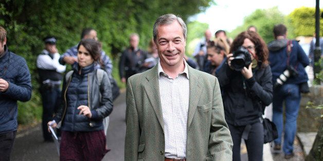 BIGGIN HILL, UNITED KINGDOM - MAY 22: United Kingdom Independence Party (UKIP) leader Nigel Farage walks home after voting at a polling station on May 22, 2014 near Biggin Hill, England. Millions of voters are going to the polls today in local and European elections. (Photo by Peter Macdiarmid/Getty Images)