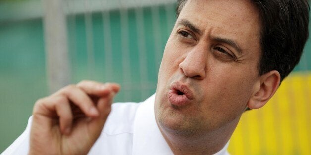 Ed Miliband, leader of Britain's opposition Labour Party gestures during a visit to a newly-built council housing complex in Lincoln on May 21, 2014 as he campaigns ahead of local council and European elections to be held in Britain on May 22, 2014. Britain and the Netherlands will kick-start the European Parliament elections by voting on May 22, 2014, three days before the majority of Europeans cast their ballots. AFP PHOTO/LINDSEY PARNABY (Photo credit should read LINDSEY PARNABY/AFP/G