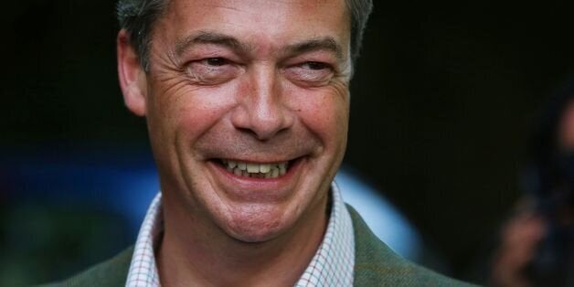 UKIP Leader Nigel Farage poses for photographers as leaves Cudham Church of England Primary School in Cudham, Kent, after casting his vote in today's Local and European elections.