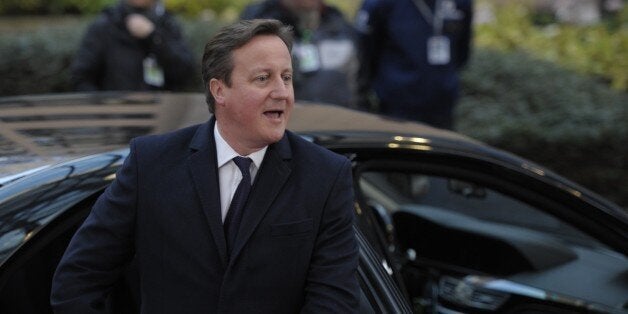 British Prime Minister David Cameron arrives to take part in an EU summit focused on the common security, Defence policy and Economic and Monetary union, in Brussels on December 19, 2013. The European Union took a historic leap towards greater integration just hours ahead of a summit today, with a deal on a banking union to prevent a re-run of the eurozone's recent crisis. AFP PHOTO / ALAIN JOCARD (Photo credit should read ALAIN JOCARD/AFP/Getty Images)