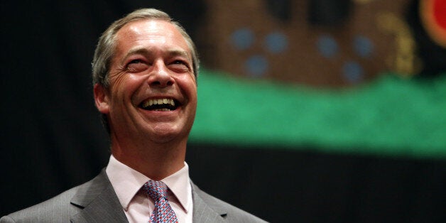 UK Independence Party leader Nigel Farage smiles as he hears the results during the European Parliamentary elections count at the Guildhall in Southampton, Hampshire.