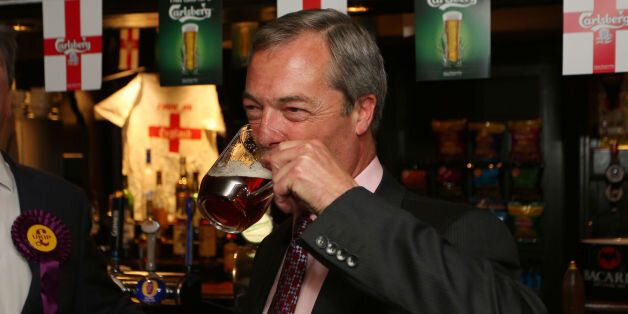 Ukip party leader Nigel Farage enjoys a pint in the Hoy and Helmet Pub in South Benfleet, Essex, as his party make gains across the country following yesterdays voting in local elections.