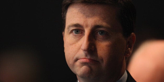 LIVERPOOL, ENGLAND - SEPTEMBER 26: Shadow Foreign Secretary Douglas Alexander listens to speakers at the Labour party conference at the Echo Arena on September 26, 2011 in Liverpool, England. Shadow chancellor Ed Balls gave a keynote speech to delegates and announced a five point plan to boost jobs and economy. (Photo by Christopher Furlong/Getty Images)