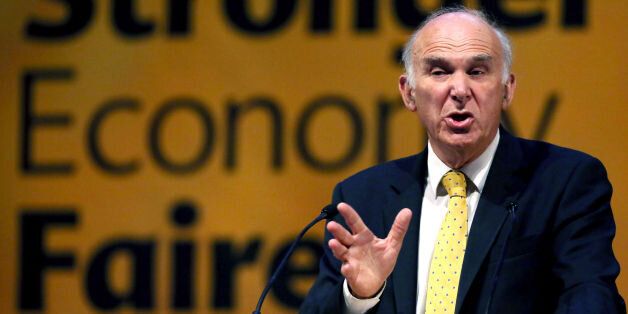 Vince Cable gives a speech after a debate on economy at the Liberal Democrat conference in Glasgow.