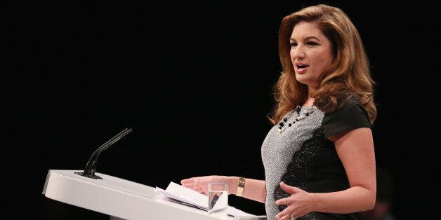 MANCHESTER, ENGLAND - SEPTEMBER 30: Businesswoman Karren Brady addresses the audience in the Main Hall of Manchester Central on the second day of the Conservative Party Conference on September 30, 2013 in Manchester, England. Chancellor of the Exchequer George Osborne has unveiled a Government plan for long-term unemployed people to undertake work placements in order to receive their benefits. (Photo by Oli Scarff/Getty Images)