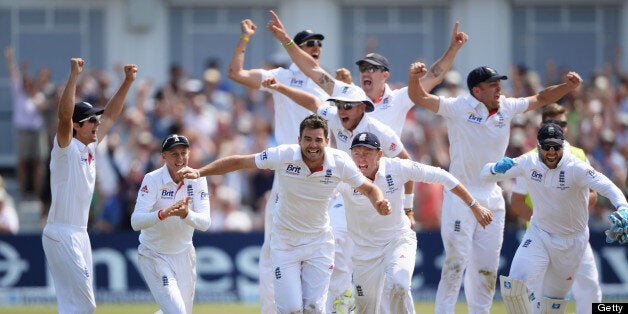 England's James Anderson (R) celebrates after claiming the wicket of Australia's Ashton Agar during the fifth day of the first Ashes cricket test match between England and Australia at Trent Bridge in Nottingham, central England, on July 14, 2013. AFP PHOTO/ANDREW YATES == RESTRICTED TO EDITORIAL USE. NO ASSOCIATION WITH DIRECT COMPETITOR OF SPONSOR, PARTNER, OR SUPPLIER OF THE ECB == (Photo credit should read ANDREW YATES/AFP/Getty Images)