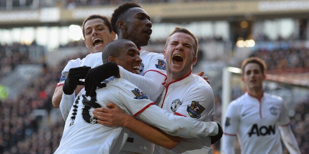 HULL, ENGLAND - DECEMBER 26: Tom Cleverley, Ashley Young, Danny Welbeck and Javier Hernandez of Manchestere United celebrate the third goal during the Barclays Premier League match between Hull City and Manchester United at KC Stadium on December 26, 2013 in Hull, England. (Photo by Laurence Griffiths/Getty Images)