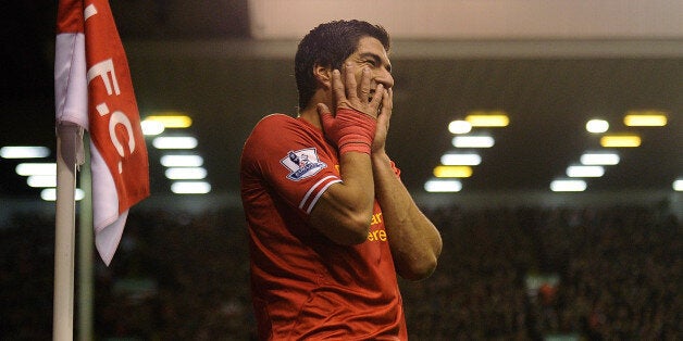 LIVERPOOL, ENGLAND - DECEMBER 04: (THE SUN OUT, THE SUN ON SUNDAY OUT) Luis Suarez of Liverpool celebrates his goal during the Barclays Premier League match between Liverpool and Norwich City at Anfield on December 4, 2013 in Liverpool, England. (Photo by Andrew Powell/Liverpool FC via Getty Images)