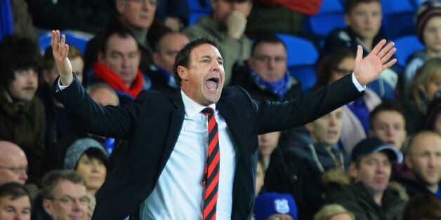 CARDIFF, WALES - DECEMBER 26: Malky Mackay, manager of Cardiff City shows his frustration during the Barclays Premier League match between Cardiff City and Southampton at Cardiff City Stadium on December 26, 2013 in Cardiff, Wales. (Photo by Christopher Lee/Getty Images)