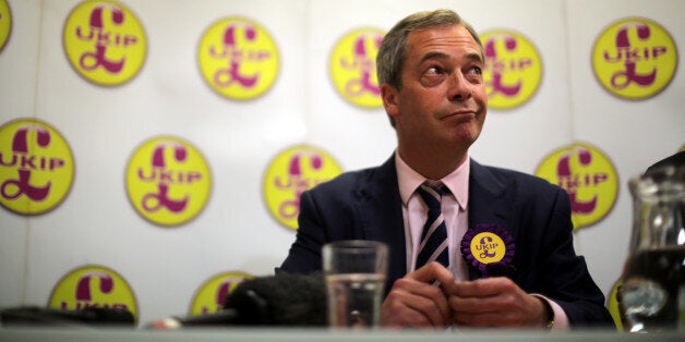 SOUTH SHIELDS, ENGLAND - APRIL 30: UK Independence Party (UKIP) Leader Nigel Farage answers questions from the media as he canvasses for votes in the South Shields local elections on April 30, 2013 in South Shields, England. The UK Independence party leader, Nigel Farage, said that his party faced 'one or two teething problems' with its 17000 candidates for Thursday's local elections after the suspension of UKIP candidate Alex Wood, who was photographed making a Nazi salute. (Photo by Christopher Furlong/Getty Images)