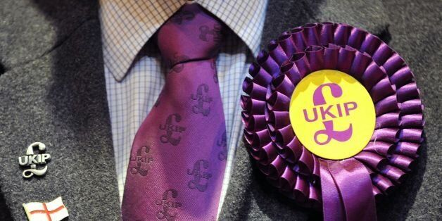 File photo dated 3/5/13 of a UKIP candidate's rosette. The UK Independence Party will fail to achieve its electoral potential because leader Nigel Farage refuses to loosen his grip on power, its former chief executive has said.