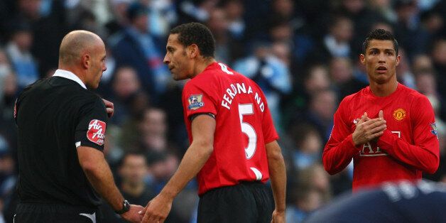 MANCHESTER, UNITED KINGDOM - NOVEMBER 30: Rio Ferdinand protests to Referee Howard Webb as Cristiano Ronaldo of Manchester United is sent off during the Barclays Premier League match between Manchester City and Manchester United at The City of Manchester Stadium on November 30, 2008 in Manchester, England. (Photo by Jamie McDonald/Getty Images)