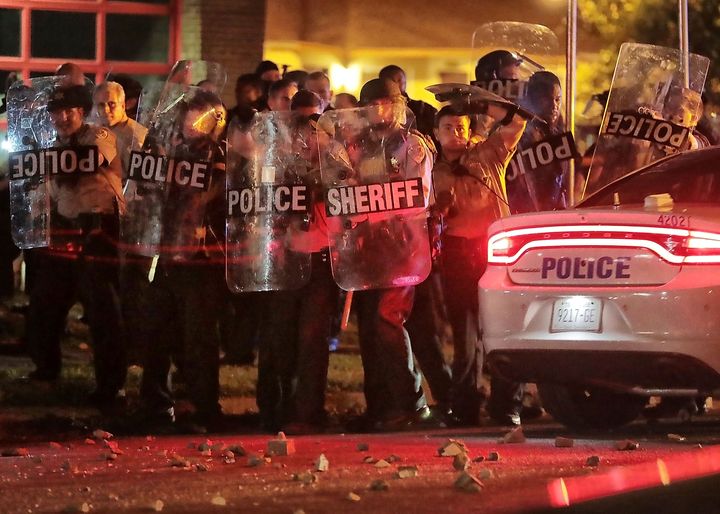 Police in Memphis brace against a crowd who took to the streets to protest after U.S. Marshals allegedly shot and killed a man early Wednesday evening. Authorities said some of the protesters threw rocks and bricks.