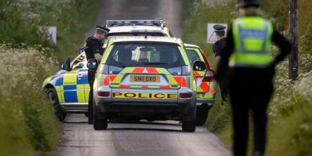 Police at the scene near Coldstream where two people were feared dead after a rally car lost control during the Jim Clark rally