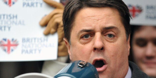 BNP leader Nick Griffin addresses the media as he leaves the High Court in London, after he fought off a bid to have him declared guilty of contempt of court today.