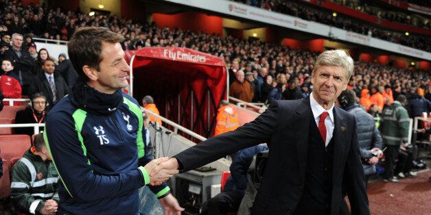 LONDON, ENGLAND - JANUARY 04: Arsene Wenger the Arsenal Manager shakes hands with Tim Sherwood the Tottenham Manager before the FA Cup 3rd Round match between Arsenal and Tottenham Hotspur at Emirates Stadium on January 4, 2014 in London, England. (Photo by David Price/Arsenal FC via Getty Images)