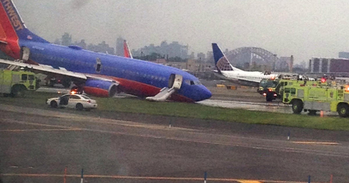 Plane Crash At New York's LaGuardia Airport Injures 10 People