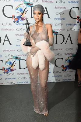 Rihanna flashes legs and a hint of boob in sexy semi-transparent summer  dress as she attends the Young Fashion Designer Award