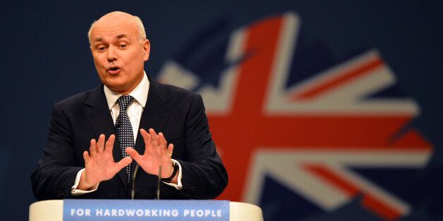 Iain Duncan-Smith, Secretary of State for Work and Pensions, addresses delegates at the annual Conservative Party Conference in Manchester, north-west England on October 1, 2013. AFP PHOTO/Paul Ellis (Photo credit should read PAUL ELLIS/AFP/Getty Images)