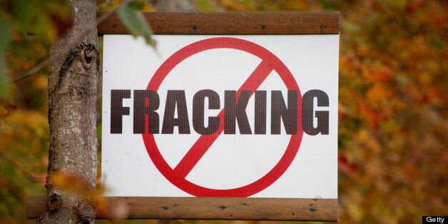 A sign protesting 'fracking,' is posted on a rural road in Tunkhannock, Pennsylvania, U.S., on Wednesday, Oct.19, 2011. The Marcellus Shale, located in the U.S. Northeast, contains natural gas, which is obtained through hydraulic fracturing, a technique in which millions of gallons of water, sand and chemicals are pumped underground to break apart the rock. Photographer: Julia Schmalz/Bloomberg via Getty Images