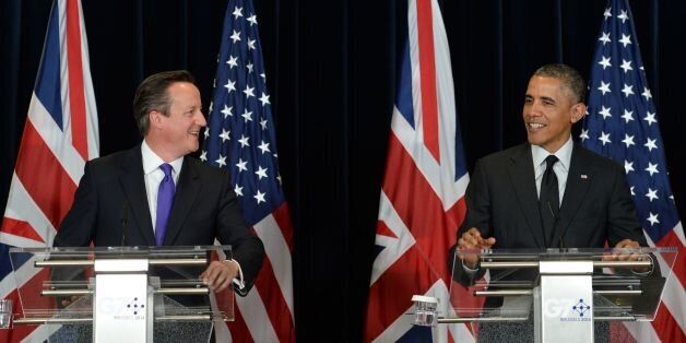 British Prime Minister David Cameron (left) holds a press conference with US President Barack Obama during the G7 Summit held at the EU headquarters in Brussels, Belgium.