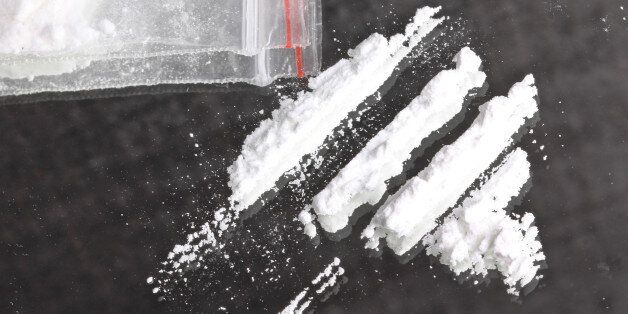 cocaine powder in lines and...