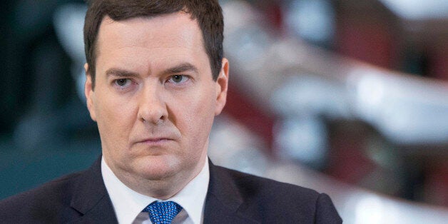 George Osborne, U.K. chancellor of the exchequer, pauses during a speech at Sertec Group Holdings Ltd., in Birmingham, U.K., on Monday, Jan. 6, 2014. Osborne set out his plan to ease the burden on families while reiterating his goal to shrink the deficit as he says tax cuts will have to be funded by spending reductions. Photographer: Jason Alden/Bloomberg via Getty Images