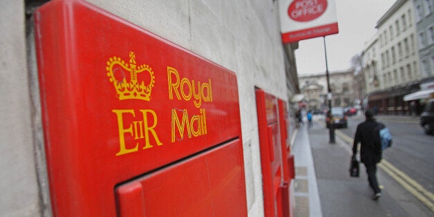 Royal Mail postboxes outside a Post Office near Covent Garden, London.