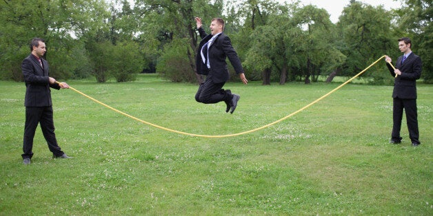 Businessmen skipping (gettystock)