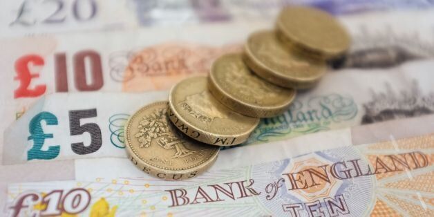 Embargoed to 0001 Monday November 18. File photo dated 18/09/12 of money as London should have a higher national minimum wage because of rising living costs and growing in-work poverty, a new report has argued.