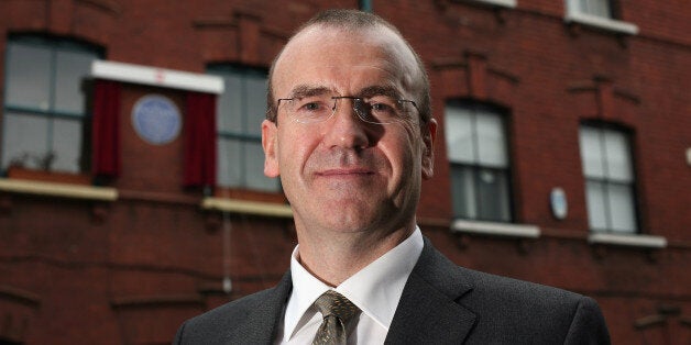 LONDON, ENGLAND - APRIL 16: Tesco Chief Executive, Sir Terry Leahy poses as a English Heritage blue plaque is unveiled for Tesco founder, Sir Jack Cohen on Ashfield Street, on April 16, 2009 in London, England. The plaque hangs in the Whitechapel area of London, which is where Sir Jack Cohen lived as a child. Tesco is set to crash through another symbolic barrier when its till takings exceed £1 billion a week for the first time. City analysts expect the supermarket to announce that its turno