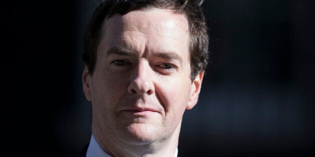 LONDON, ENGLAND - JUNE 10: Chancellor of the Exchequer George Osborne leaves Number 11 Downing Street on June 10, 2014 in London, England. Mr Osborne is due to announce this week new incentives for builders to develop derelict sites in towns and cities to help protect the green belt. (Photo by Oli Scarff/Getty Images)