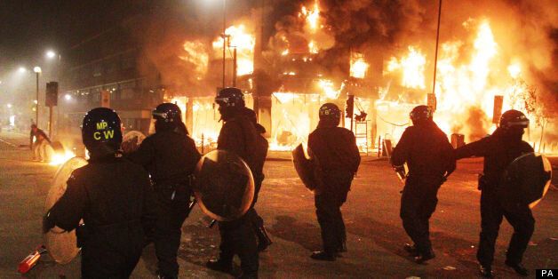 Riot police during the first night of the riots, in Tottenham, London
