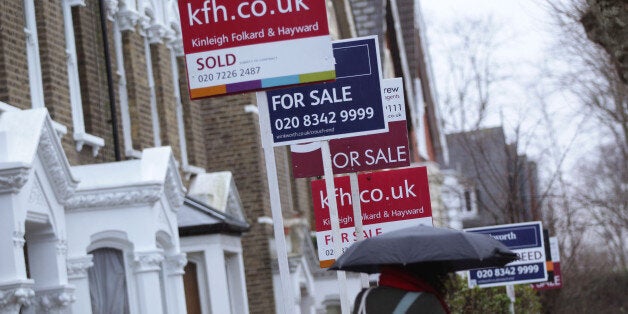 For Sale signs displayed outside houses in Finsbury Park, North London.